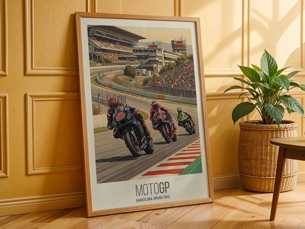 Side profile of a Ducati MotoGP bike in a chasing pack with blurred competitors behind