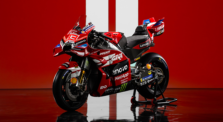 Close-up of a Ducati GP front winglet showing its carbon-fiber profile and mounting brackets