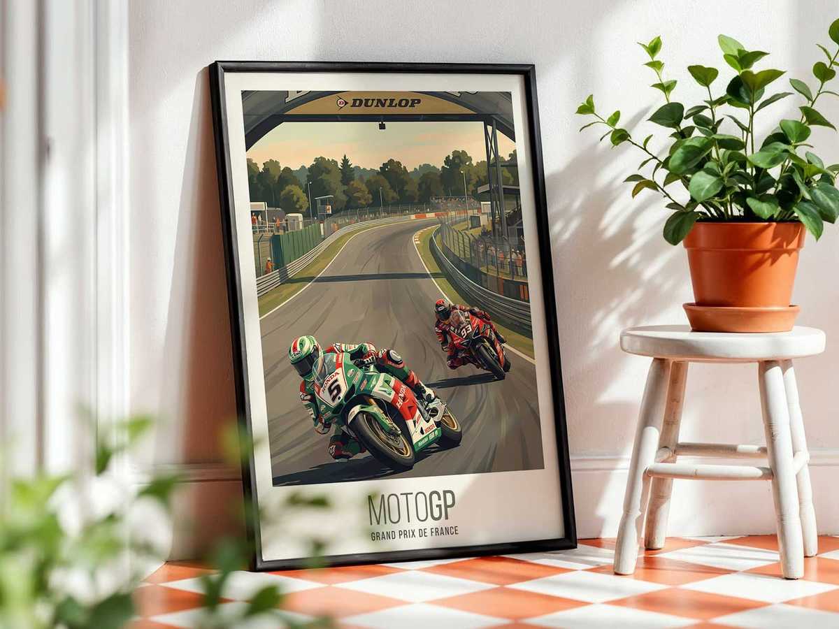 Styled interior photo showing the French MotoGP poster mounted above a sofa, demonstrating immersive wall decoration