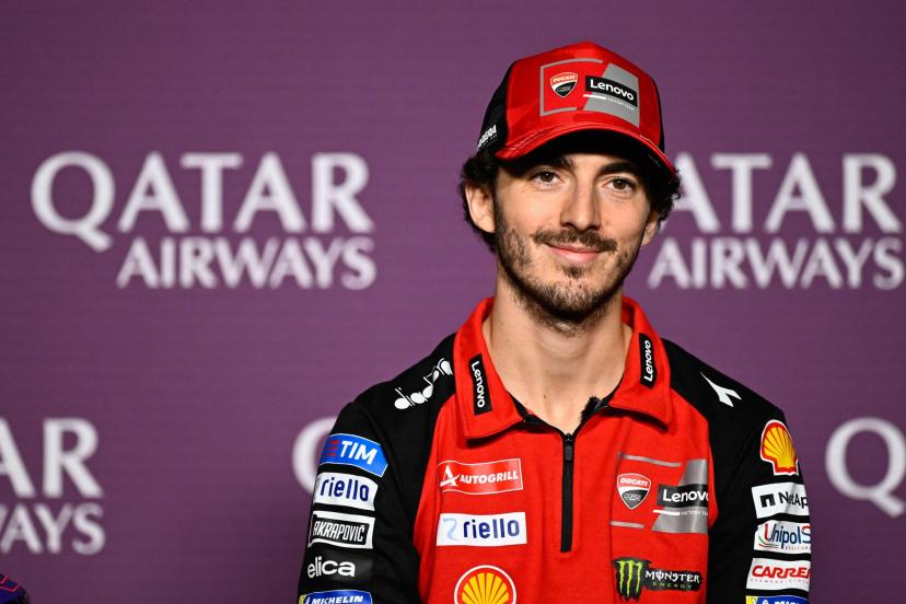 Pecco Bagnaia riding his Ducati in his early MotoGP season, leaning into a corner during a race weekend