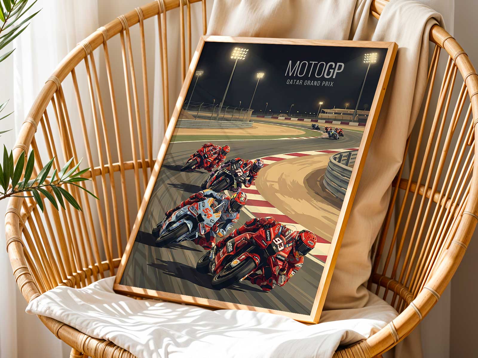 Wide view of a Ducati MotoGP bike accelerating out of a Lusail corner under night lights